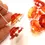 Thumbnail: Red and Orange caps beads with white frit