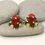 Thumbnail: Red pair cone beads with raised dots