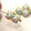 Thumbnail: Pale Blue rondelle beads 12mm with yellow raised dots