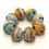 Thumbnail: Artisan matte donut beads for jewelry