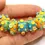 Thumbnail: Green-Yellow rondelle beads 12mm with raised dots