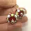 Thumbnail: Red pair cone beads with raised dots