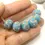 Thumbnail: Turquoise rondelle beads 12mm with lava textured