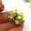 Thumbnail: Yellow-Grey rondelle beads 12mm with raised dots