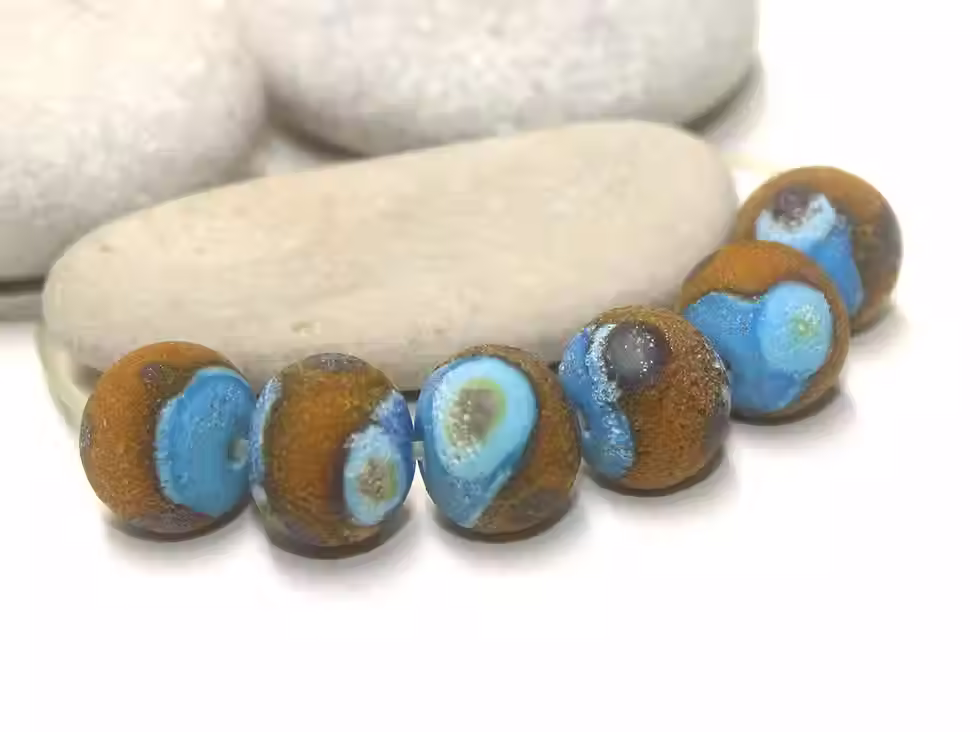 Etched nuggets beads with lava textu