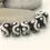 Thumbnail: Black rondelle beads 14mm with lava textured