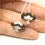 Thumbnail: White pair beads with ruffle