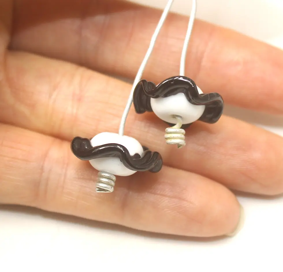 White pair beads with ruffle