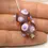 Thumbnail: Purple etched pair beads with raised dots