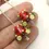 Thumbnail: Red pair cone beads with raised dots
