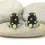 Thumbnail: Black pair cone beads with raised dots
