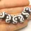 Thumbnail: Black rondelle beads 14mm with lava textured