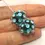 Thumbnail: Teal Green pair glass beads with raised dots 14mm