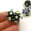 Thumbnail: Black-Green rondelle beads 12mm with raised dots