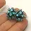 Thumbnail: Teal Green pair glass beads with raised dots 14mm