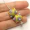 Thumbnail: Green pair beads with raised dots