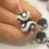 Thumbnail: Black rondelle beads 14mm with lava textured