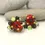 Thumbnail: Red pair cone beads with raised dots