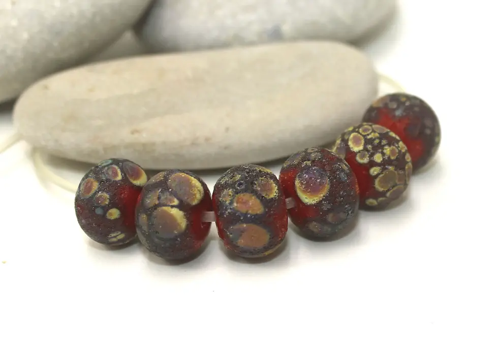 Red rondelle beads 12mm with lava textured