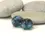 Thumbnail: Teal Green pair lampwork beads with raised dots 14mm