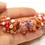 Thumbnail: Carrot-Purple rondelle beads 12mm with raised dots