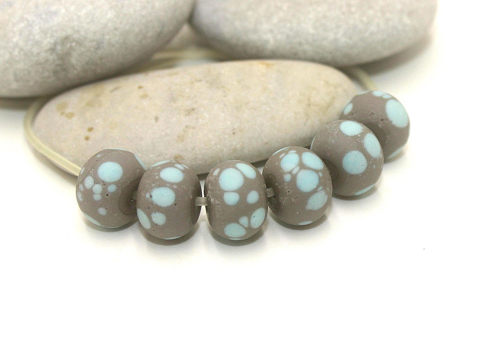 Grey rondelle beads 12mm with lava textured