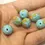 Thumbnail: Turquoise rondelle beads 12mm with lava textured