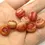 Thumbnail: Red etched rondelle beads 12mm