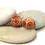 Thumbnail: Red-Orange pair glass beads with raised dots 14mm