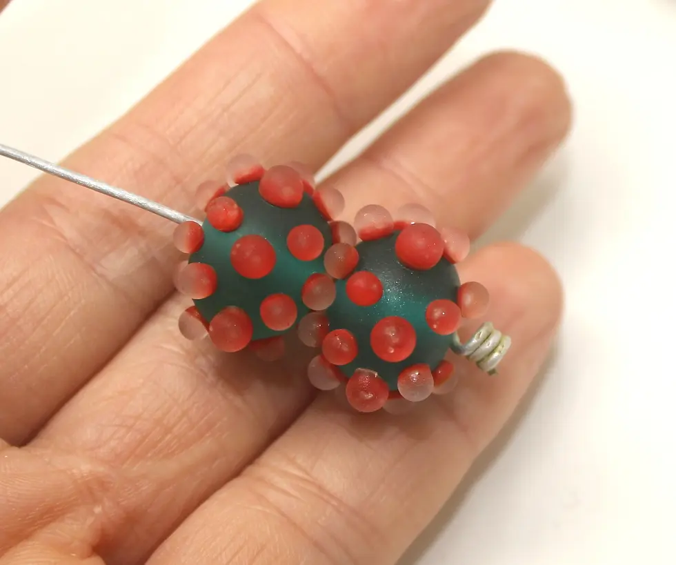 Teal Green etched pair beads with raised dots 14mm