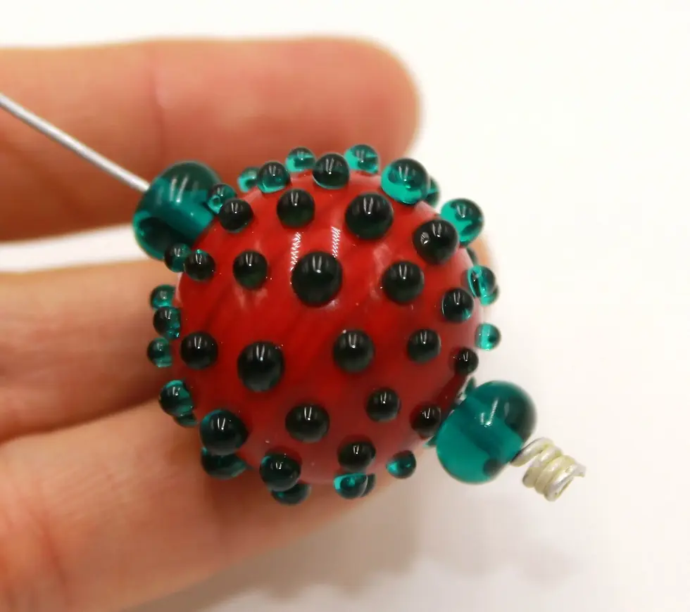 Burgundy hollow glass bead with raised dots 20(22)mm