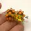 Thumbnail: Green pair beads with raised dots
