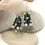 Thumbnail: Black pair cone beads with raised dots