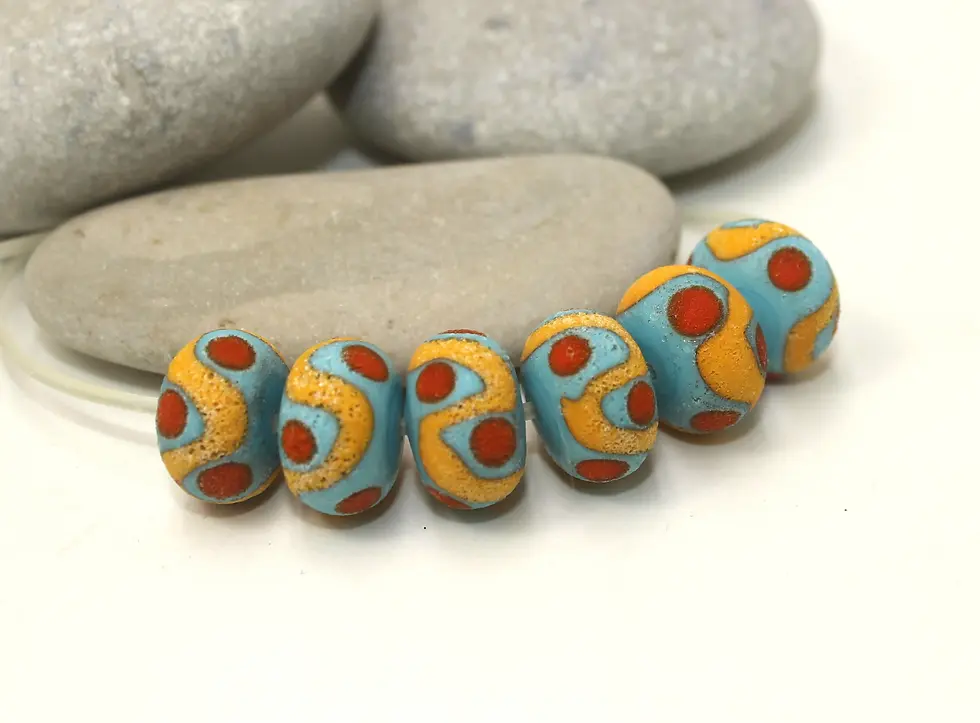Artisan rondelle beads 14mm with lava textured