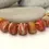 Thumbnail: Red etched rondelle beads 12mm