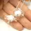 Thumbnail: White-Clear pair glass beads with ruffle