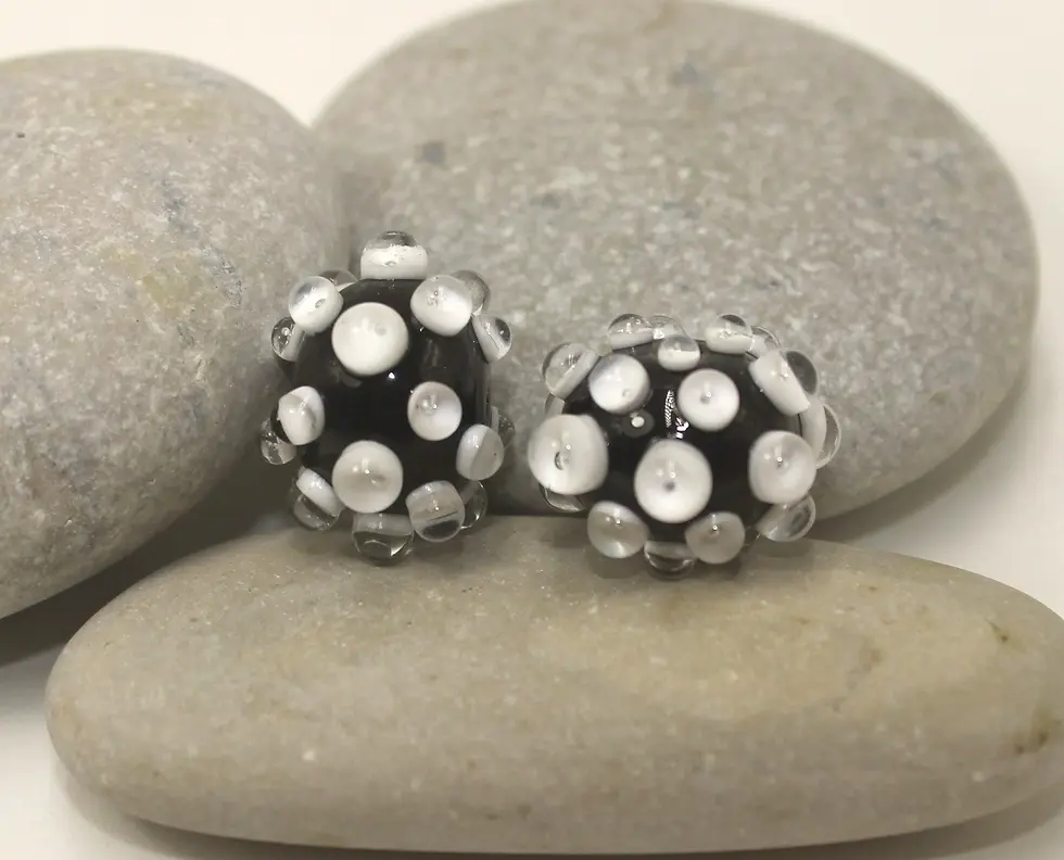 Black pair beads with raised dots