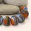 Thumbnail: Artisan matte donut beads for jewelry