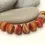 Thumbnail: Red etched rondelle beads 12mm