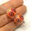 Thumbnail: Red-Orange pair glass beads with raised dots 14mm
