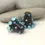 Thumbnail: Dark Grey pair cone glass beads with raised dots