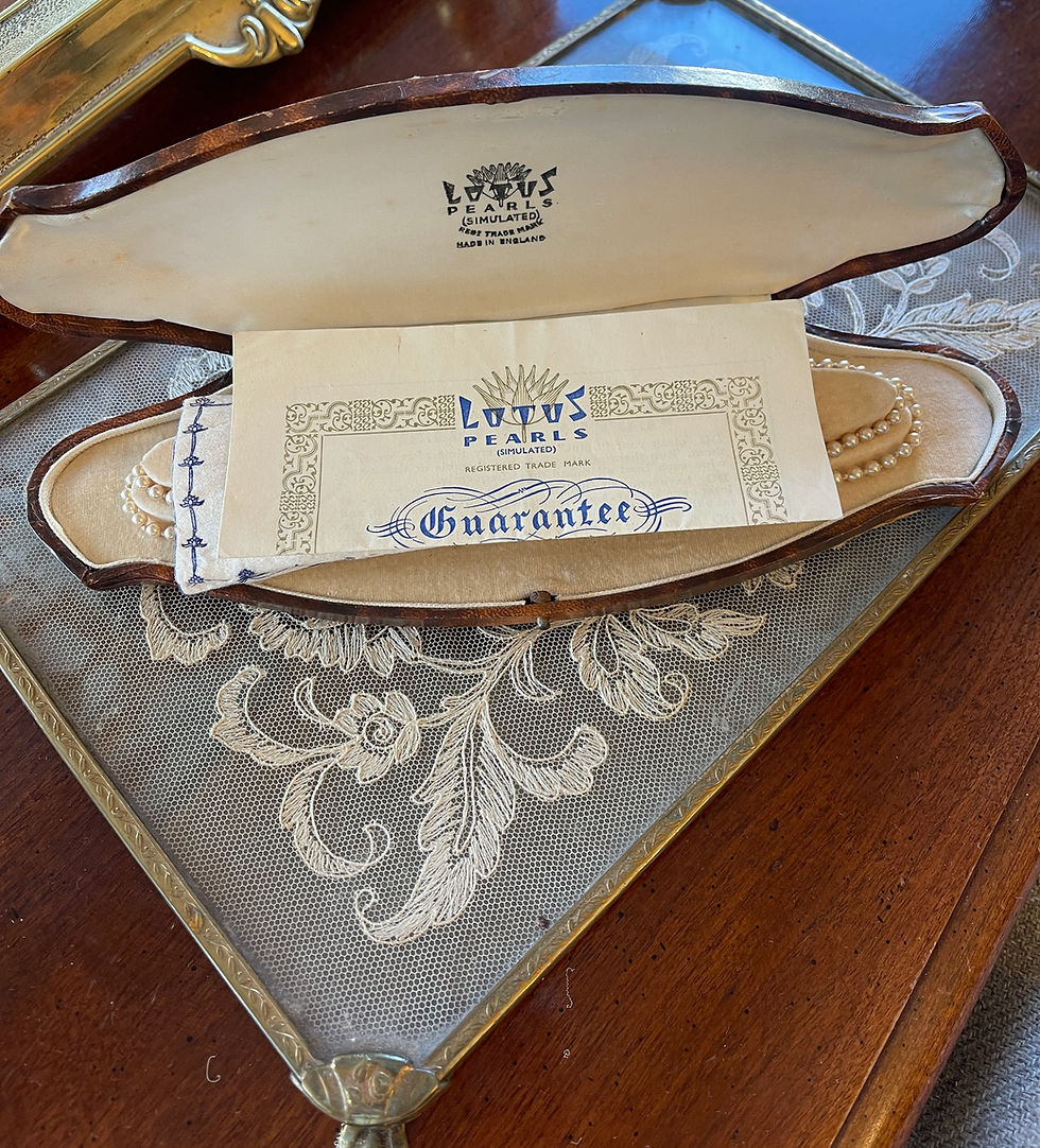 Thumbnail: double strand pearl necklace laying in leather box lined in cream velvet with original branded tissue and gaurentee