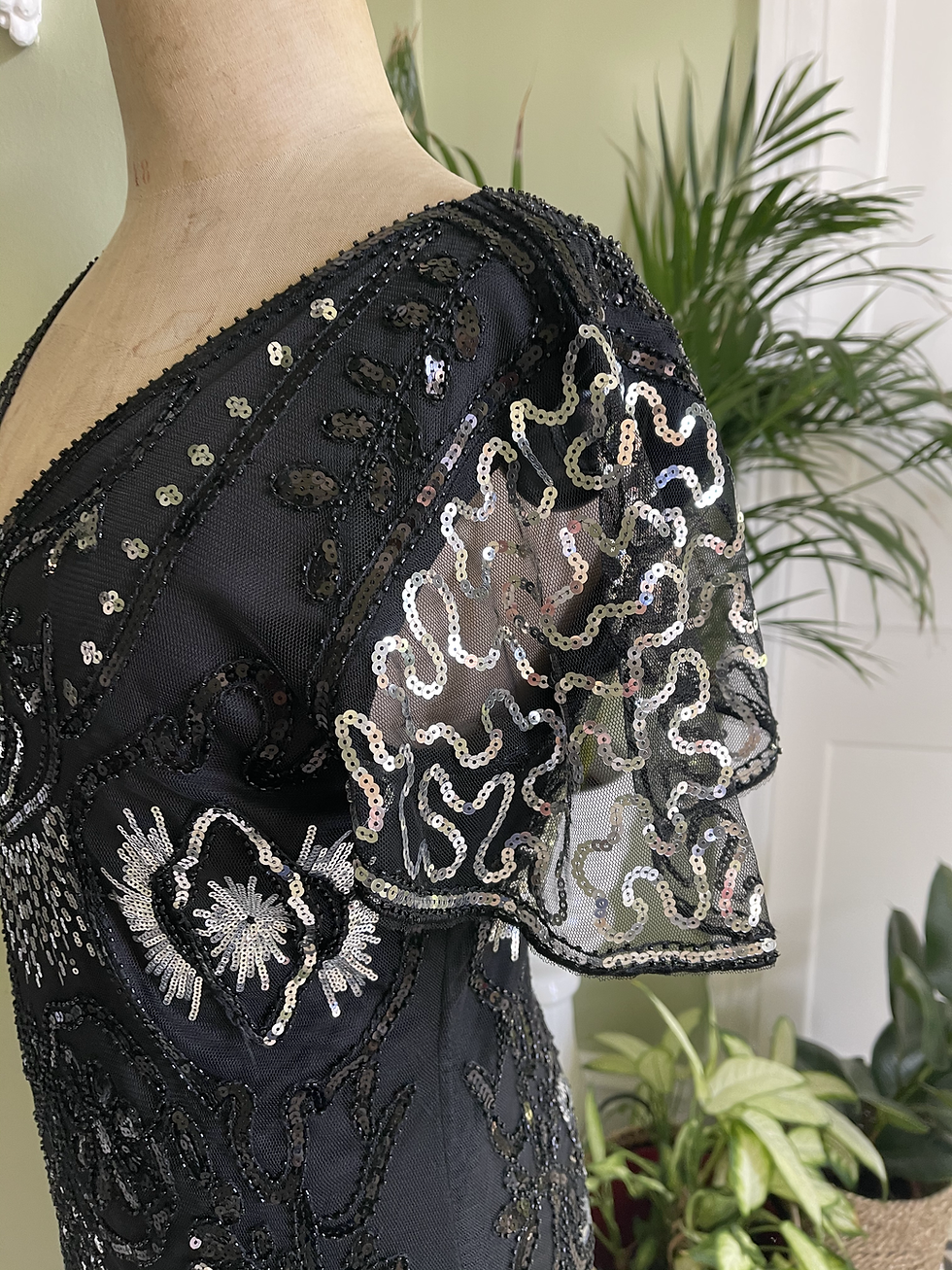 Thumbnail: 1920s Style Fringed Black and Silver Sequinned Dress Sleeve View