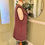 Thumbnail: elsh wool tapestry tabard in brown blue and pink with gold clasp edged in brown wool