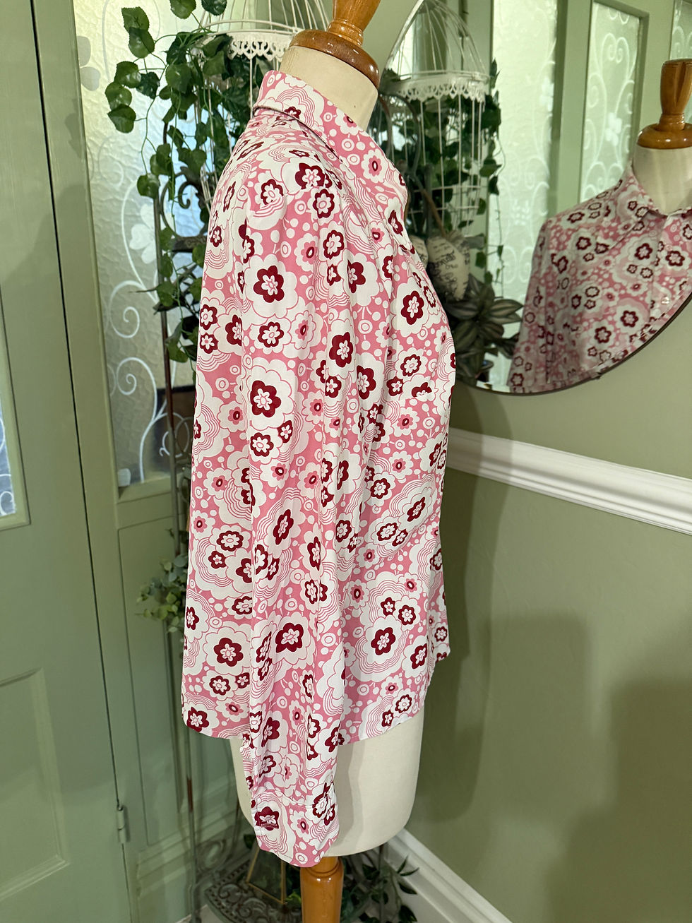 Thumbnail: pink white and burgundy flower power print long sleeve ladies shirt from 1960s with long rounded collars.