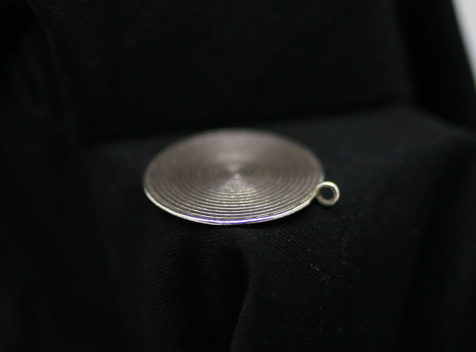 Karen Hill Tribe silver circular bead with a hoop and concentric groove pattern