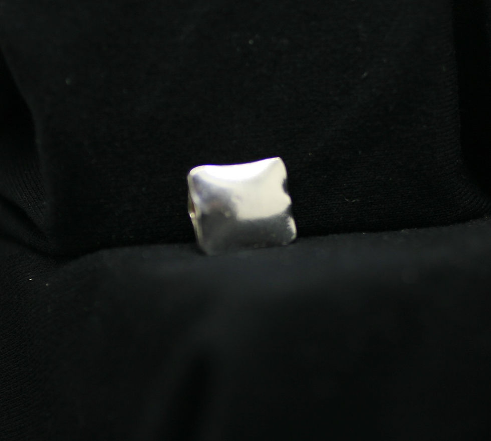 Karen Hill Tribe silver pillow-shaped bead with a smooth texture and rounded