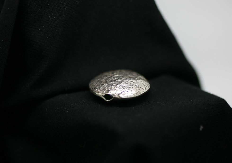 Thumbnail: Karen Hill Tribe silver bead with circular shape and pockmarked surface texture