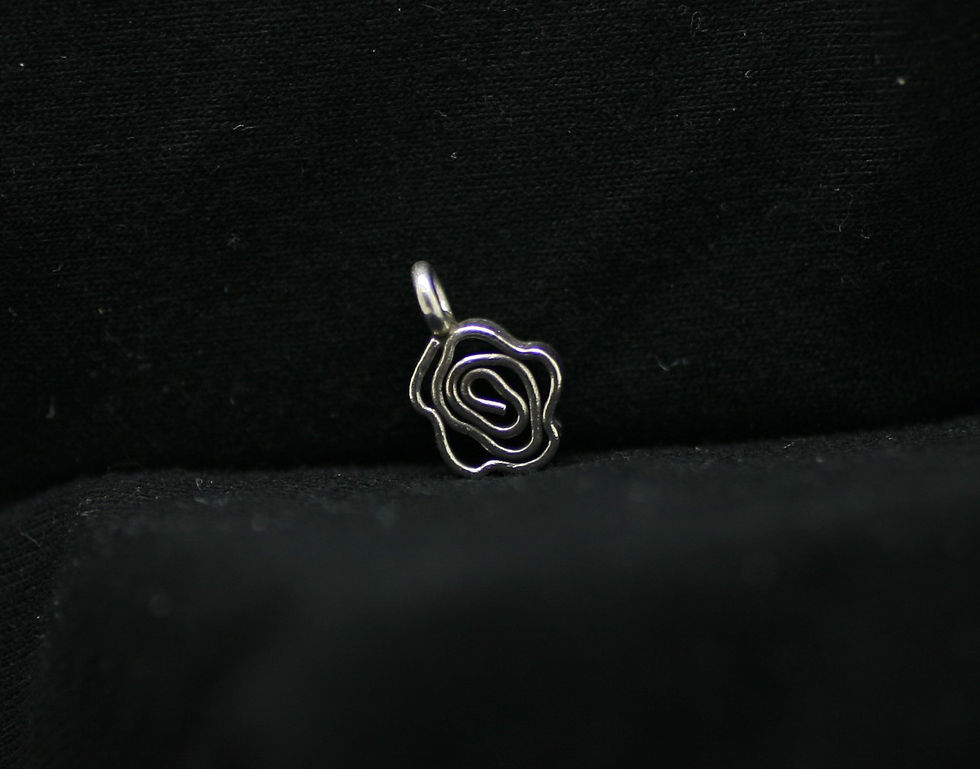Thai silver flower-shaped bead with a loop