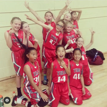 4th grade players on team smile and cheer showing how much they love Torch and each other